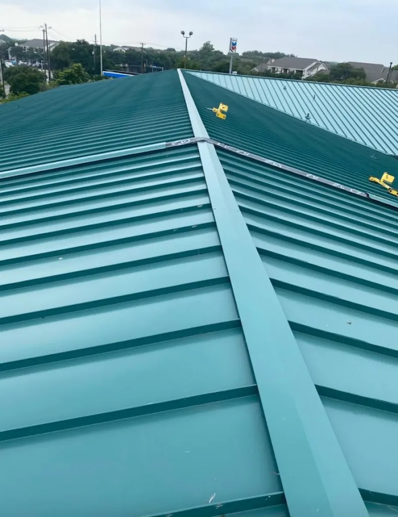 Green commercial metal roof ridge and valley for Metal Roof Repair in Archbald